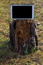 Tablet with blank screen in rural countryside environment Royalty Free Stock Photo