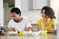 Tablet, breakfast and couple in kitchen online for social media, internet and app in morning. Marriage, love and curious Royalty Free Stock Photo