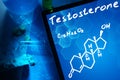 Tablet with the chemical formula of testosterone. Royalty Free Stock Photo