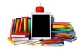 Tablet, colorful books, school supplies and an apple Royalty Free Stock Photo