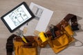 Tablet computer with architecture and construction tools and blueprints Royalty Free Stock Photo