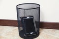 Tablet computer is in empty waste basket