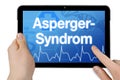 Tablet computer with the german word for Asperger syndrome - Asperger Syndrom