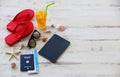 Tablet computer and passport on wood background Royalty Free Stock Photo