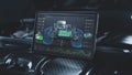 Tablet computer screen shows 3D visualization of car diagnostics software