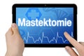 Tablet computer with touchscreen and the german word for mastectomy