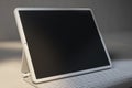 Tablet with detachable keyboard on a minimalistic background. 3D Rendering