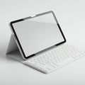 Tablet with a detachable keyboard on a white background. The tablet is positioned Royalty Free Stock Photo