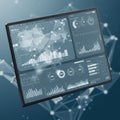 Tablet displaying a data analytics dashboard featuring graphs, charts, and diagrams. Royalty Free Stock Photo