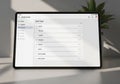 A tablet displays a task management app interface with a list titled \