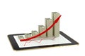 Tablet - dollar bar graphs showing profit grow Royalty Free Stock Photo