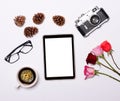 Tablet with empty screen camera and other retro objcects around it on white background - Trendy minimal flat lay concept Royalty Free Stock Photo