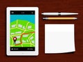 Tablet with gps navigation application, pen, pencil and sticky n