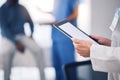 Tablet, hands and doctor with mockup in hospital for healthcare services, surgery data and working in busy clinic Royalty Free Stock Photo