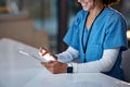 Tablet, healthcare and hands of nurse working online for medical research, planning and schedule in hospital. Telehealth