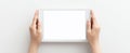 The tablet held in hands against a white background for mockup purposes. AI generated image Royalty Free Stock Photo