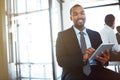 Tablet, lawyer and portrait of black man in office for business, research app or coworking. Face, technology and smile Royalty Free Stock Photo