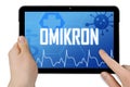 Tablet with medical touchscreen and diagnosis omikron corona-virus Covid-19 and long-covid Royalty Free Stock Photo