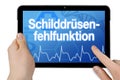 Tablet with medical touchscreen and the german word for abdominal wall hernia - bauchdeckenbruch Royalty Free Stock Photo