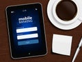 tablet with mobile banking login page, cup of coffee, pen and white note