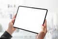 Tablet mockup close-up. Woman holding modern tablet with thin edges