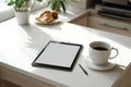 Tablet Mockup on Kitchen Table with Coffee and Breakfast Royalty Free Stock Photo