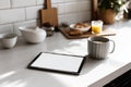 Tablet Mockup on Kitchen Table with Coffee and Breakfast Royalty Free Stock Photo