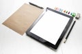 Tablet with office supplies Royalty Free Stock Photo