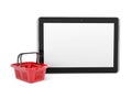 Tablet PC and basket for purchasings Royalty Free Stock Photo