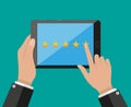 Tablet pc with five star rating on screen Royalty Free Stock Photo