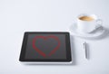 Tablet pc and pen with cup of coffee Royalty Free Stock Photo
