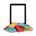 Tablet Pc on top of an Heap of Books