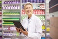 Tablet, pharmacy portrait and pharmacist woman for product management, stock research and inventory. Digital technology Royalty Free Stock Photo