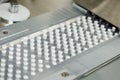 Tablet pill production. Blistering conveyer