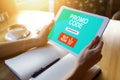 Tablet with promo code field on screen. E-commerce, mobile marketing concept. Royalty Free Stock Photo