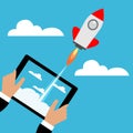 Tablet with a rocket.Concept of Start up. Royalty Free Stock Photo