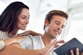 Tablet, search and happy couple in a house with social media, streaming or watching video, film or show at home. Digital