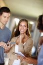 Tablet, smile and team of business people in discussion, planning or brainstorming ideas in startup office. Group, woman Royalty Free Stock Photo