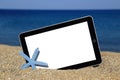 Tablet template on the beach