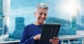 Tablet, thinking and happy senior business woman on a balcony laughing at social media, gift or chat. Digital, search Royalty Free Stock Photo