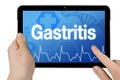 Tablet with touchscreen and medical background with diagnosis gastritis