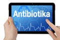 Tablet with touchscreen and medical interface with the german word for antibiotics - Antibiotika