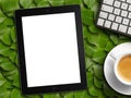 Tablet white screen similar to ipad display and coffee Royalty Free Stock Photo