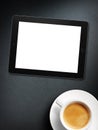 Tablet white screen similar to ipad display and coffee Royalty Free Stock Photo