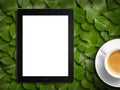 Tablet white screen similar to ipad display and coffee Royalty Free Stock Photo