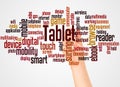 Tablet word cloud and hand with marker concept