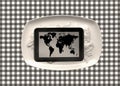 Tablet with world map Royalty Free Stock Photo