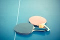 Tabletennis or ping pong rackets and balls on table. Sport concept