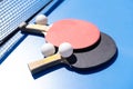 Tabletennis or ping pong rackets and balls on table. Sport concept.