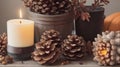 A tabletop arrangement of pinecones, acorns, and a rustic candle, evokes a sense of fall tranquility